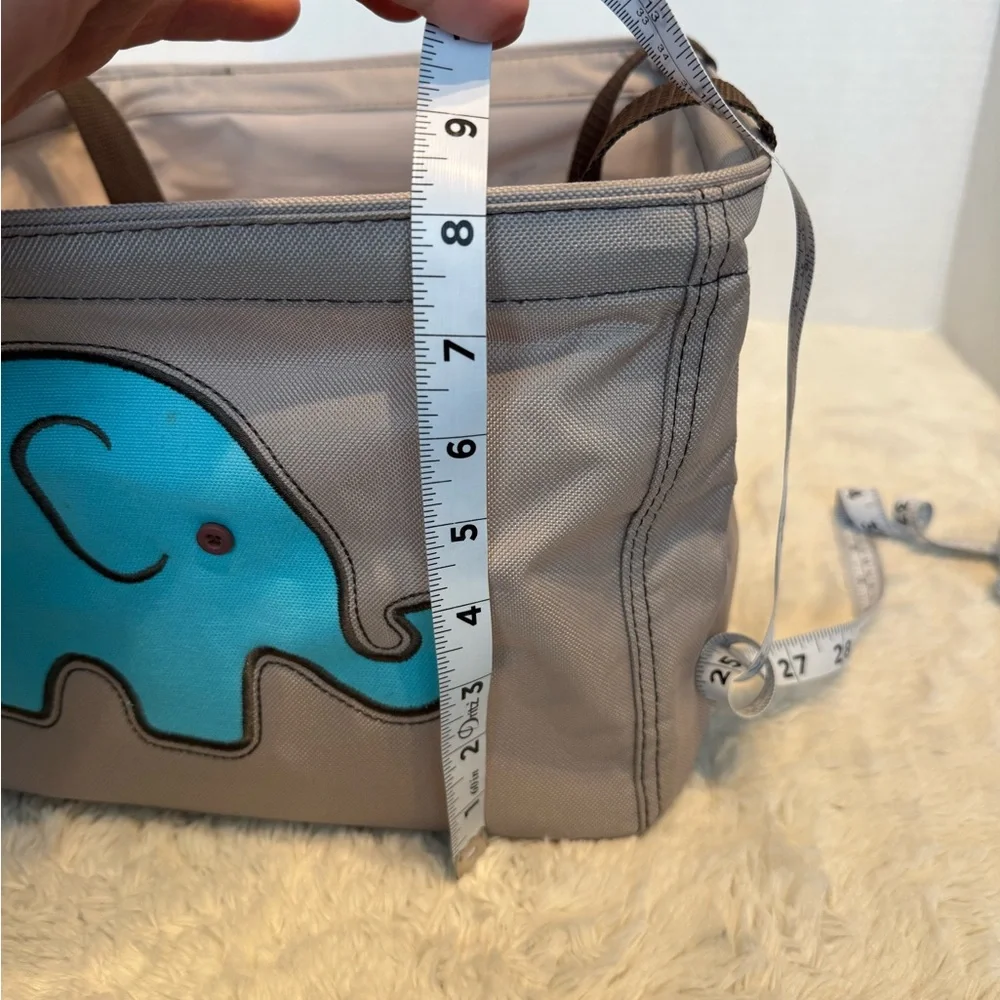 thirty-one small square beige colored tote with brown handles & blue elephant